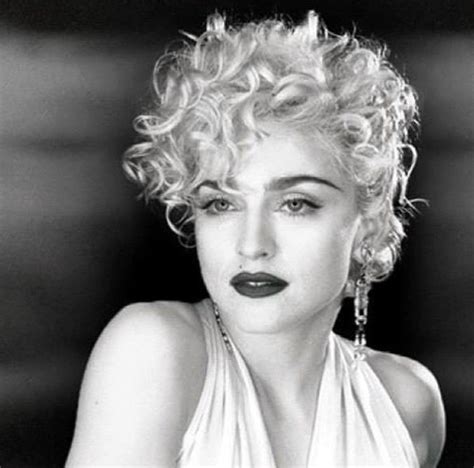 Madonna Goes Topless While Striking a Pose